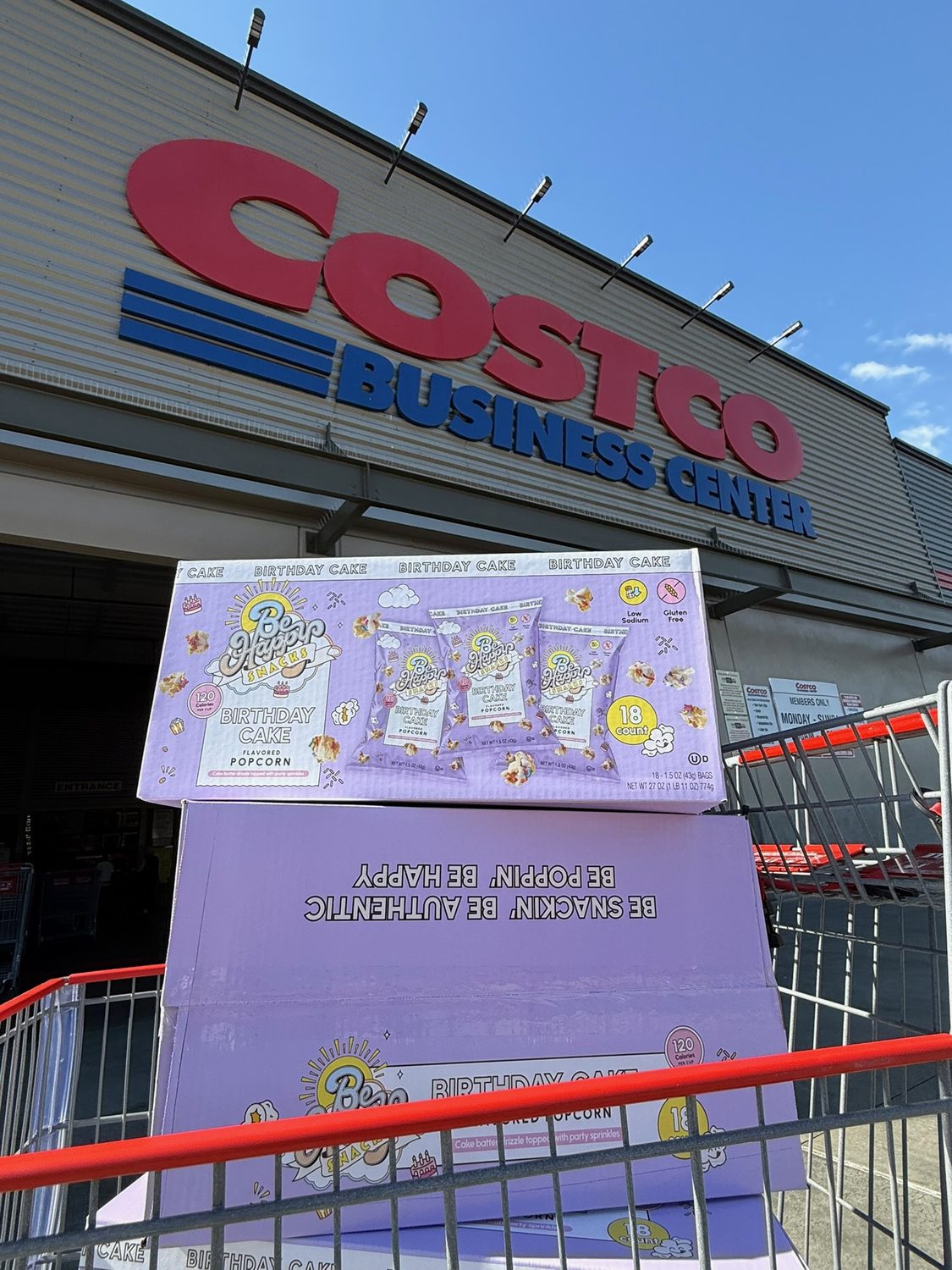 A Be Happy Snacks display outside a Costco Business Center